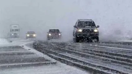 بارش دیدنیِ برف بهاری در جاده طرقبه
