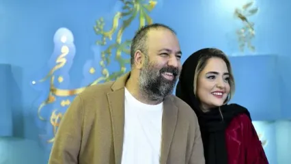 بوسه جنجالی علی اوجی به دستان همسرش وایرال شد