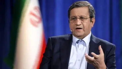 همتی: قیمت دلار سقوط می‌کند