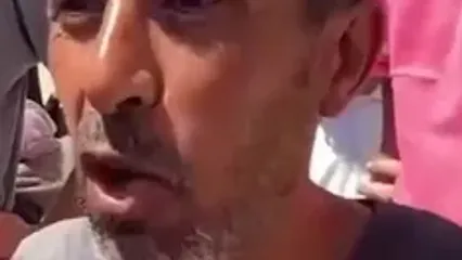 توزیع آرد در میان اهالی شهر غزه از سوی برنامه جهانی غذا