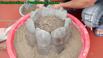 ببینید؛ نحوه ساخت یک گلدان زیبا با بطری پلاستیکی و سیمان