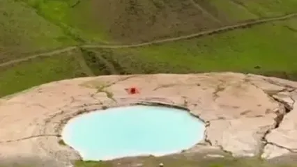 در سفر نزدیک تهران جوشیدن چشمه در دشت لار را ببینید