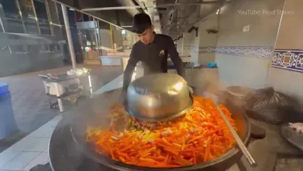 ببینید؛ غذای خیابانی در ازبکستان؛ پخت 400 کیلو سمرقند پلو با گوشت در تاشکند