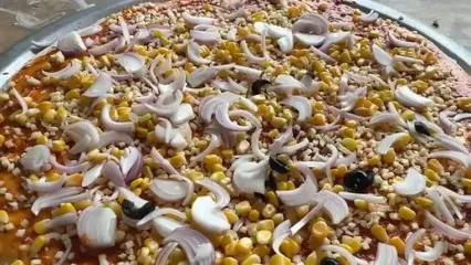 ببینید؛ غذای روستایی در هند؛ پخت 99 عدد پیتزا در تنورخانگی