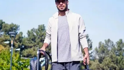 درگیری عجیب خلیل‌زاده با یک خبرنگار در فرودگاه