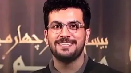 نوشابه باز کردن امیرحسین قیاسی بعد از دریافت جایزه حافظ: حق به حق دار رسید ولی در تعجبم که چرا ...