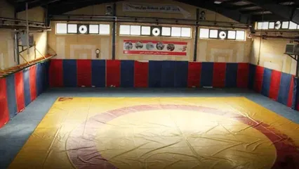 تصاویر قمه‌کشی هولناک در سالن کشتی نهاوند