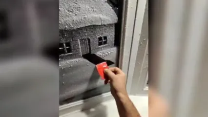 هنرمند بریتانیایی با اسپری برف، پنجره‌ها را نقاشی می‌کند!