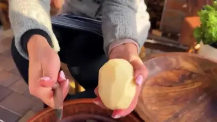 غذای روستایی در اوکراین؛ کباب کردن 100 بال مرغ با آناناس در تنور