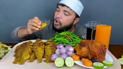 غذا خوردن با صدا؛ خوردن 4 کیلو ماهی و مرغ کبابی به روش جوان بنگلادشی