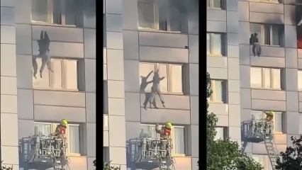 فیلم لحظه نجات معجزه‌آسای زن از طبقه یازدهم/ پرش مرگ و زندگی در آتش‌سوزی ساختمان 15 طبقه