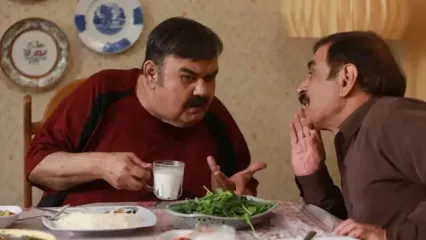 گفتگوی بامزه منوچهر هادی با یک طوطی