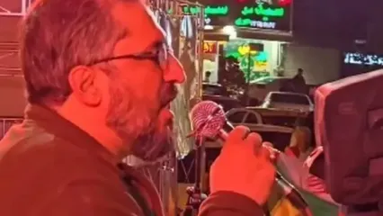 شعار بی‌غیرت علیه علی‌اف در میدان کاج تهران